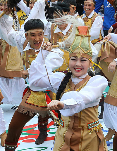 Gangnam style parade: Members of a troupe from Russia's Sakha Federal Republic