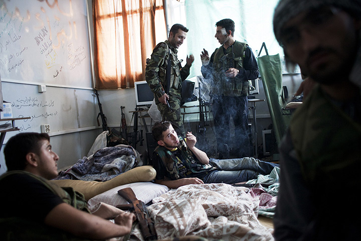 24 hours in pictures: Syrian rebels rest during a lull in fighting with regime forces