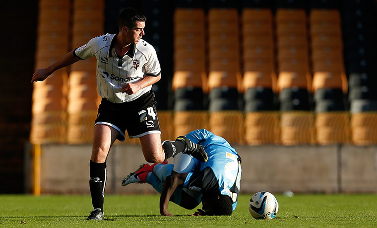 Port Vale: Richard Duffy goes past Junior Morias
