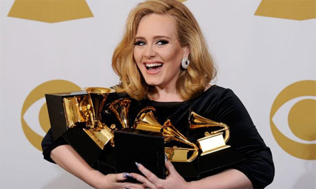 Rock-a-bye baby â€¦ singer Adele will have her arms full. Photograph ...