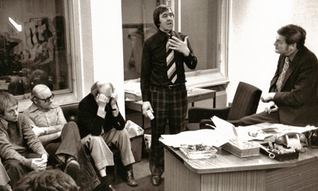 Brian Jones, standing