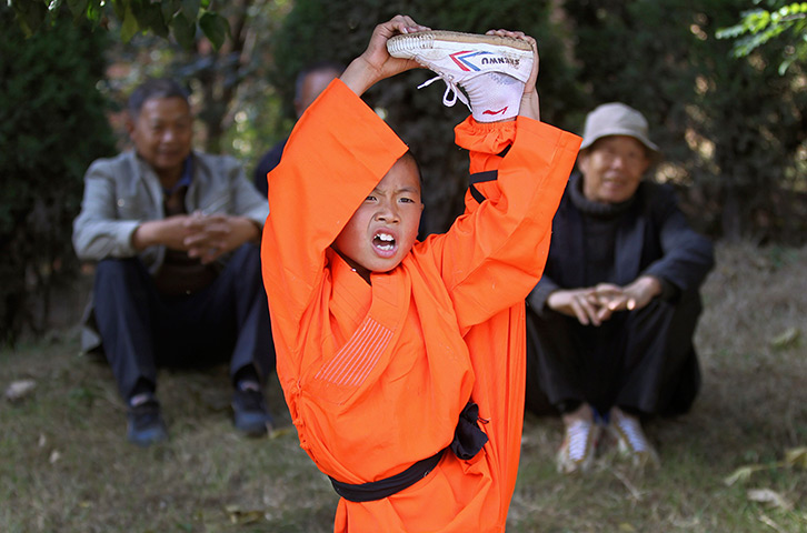 Kung Fu festival : A Shaolin martial arts student performs during a welcome ceremony 