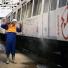 Underground book: Graffiti being removed from a train