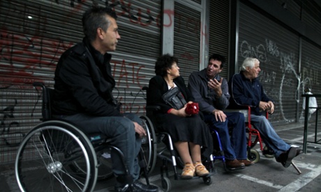 People with disabilities take part in a march against the government's new austerity measures outside the labour ministry in central Athens
