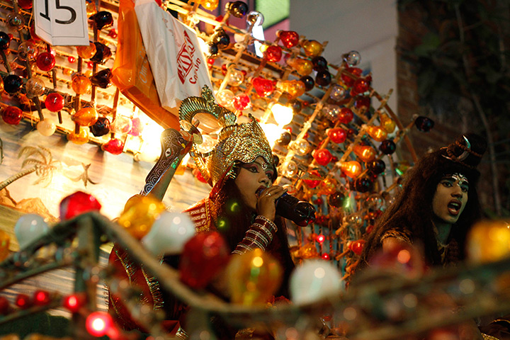 24 hours in pictures: Indian artist dressed as a Hindu deity quenches her thirst