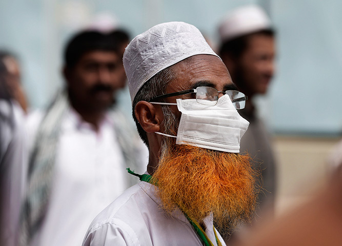 24 hours in pictures: Muslim pilgrims leave the Grand mosque, Saudi Arabia