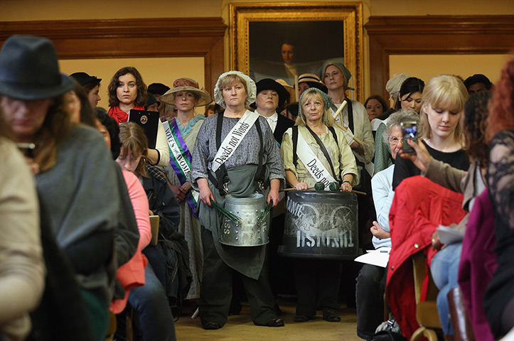 Sufragette march: Campaigners, some dressed as suffragettes, attend a rally