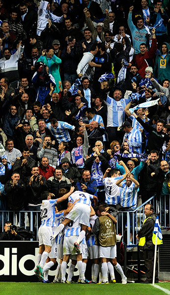 Wed champs league 2: Malaga's players celebrate 