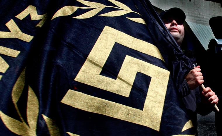 Golden Dawn: A member of the extreme right Golden Dawn party