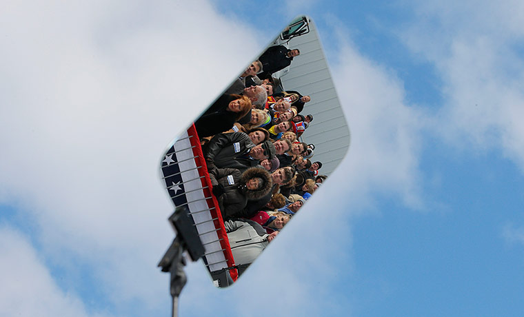 24 hours: Members of the crowd are reflected in a teleprompter