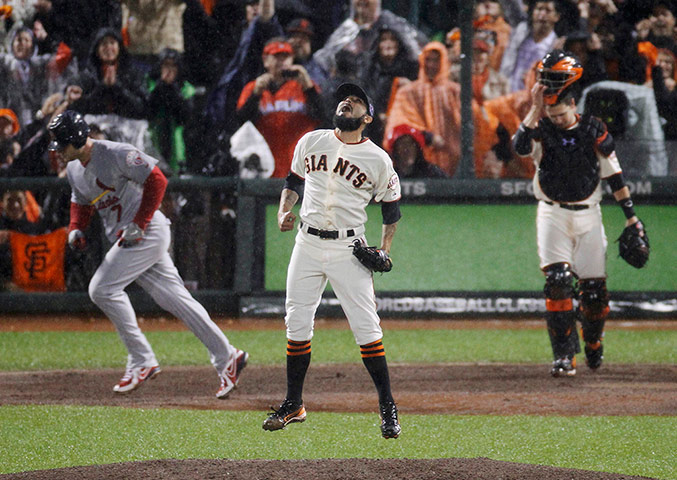 WS12: SF Giants' Romo celebrates after Cardinals Holliday pops out in Game 7