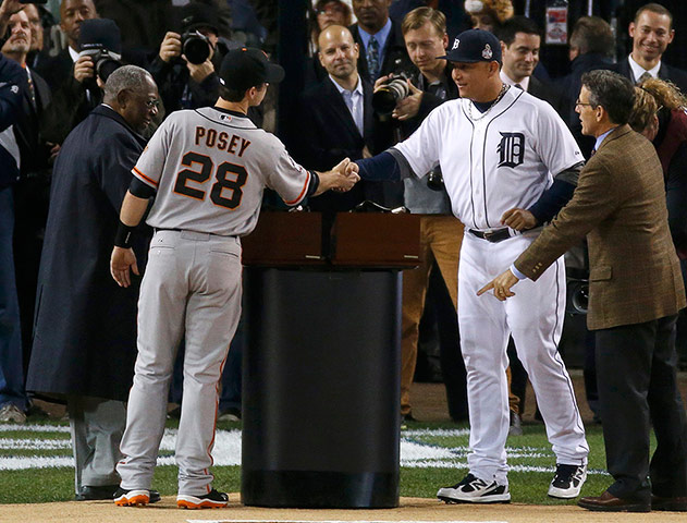 WS12: Detroit Tigers' Cabrera shakes hands with San Francisco Giants' Posey