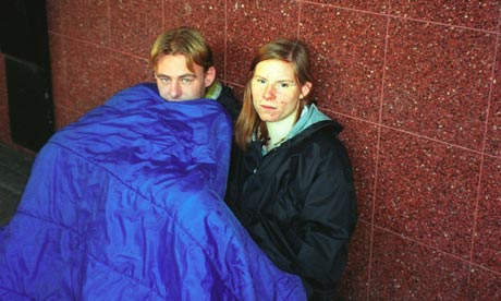 Young homeless couple