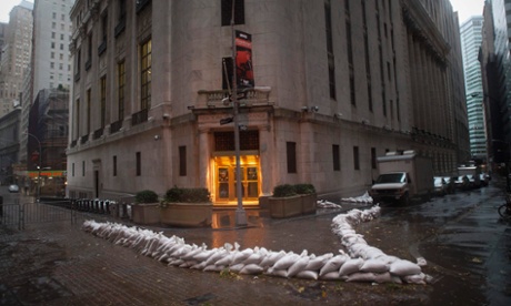 Sandbags block the entrance of the New York Stock Exchange in downtown Manhattan as Hurricane Sandy approaches the city.