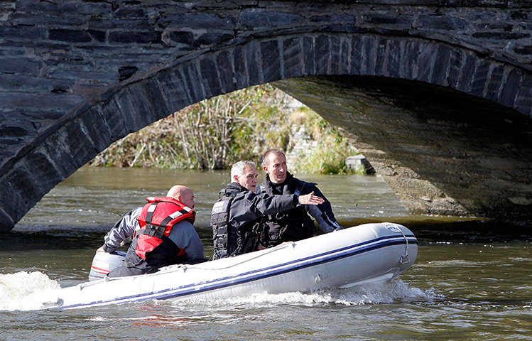 April Jones day 2: Police officers search the river Dyfi