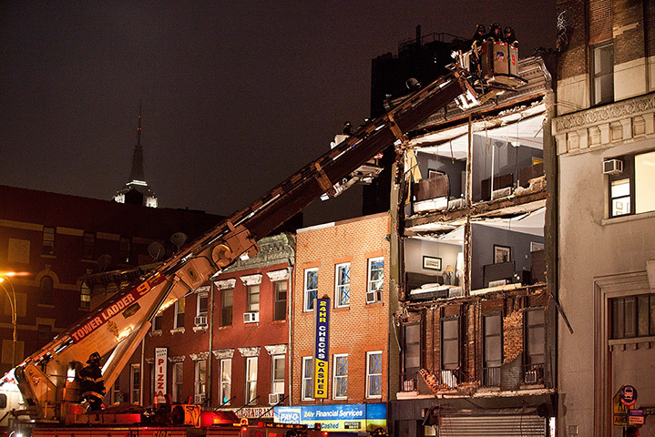 Sandy hits New York: An apartment building where the front wall collapsed 
