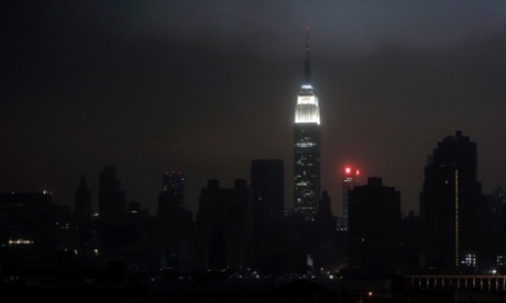 A blacked-out New York City skyline, Hurricane Sandy made landfall in the northeastern United States.