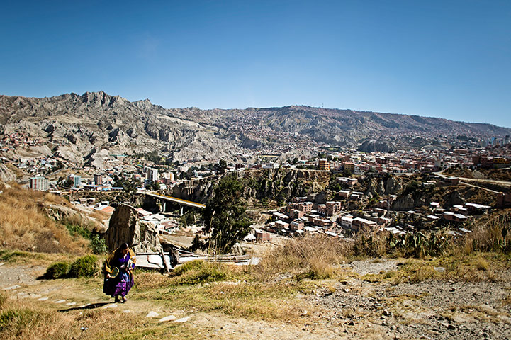 Cholitas: Marta La Altena head up the valley towards the main road