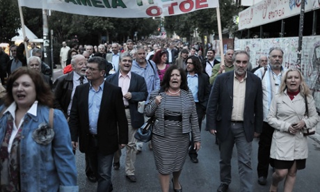 Greek banks pensioners and employees march in central in Athens on October 30, 2012,