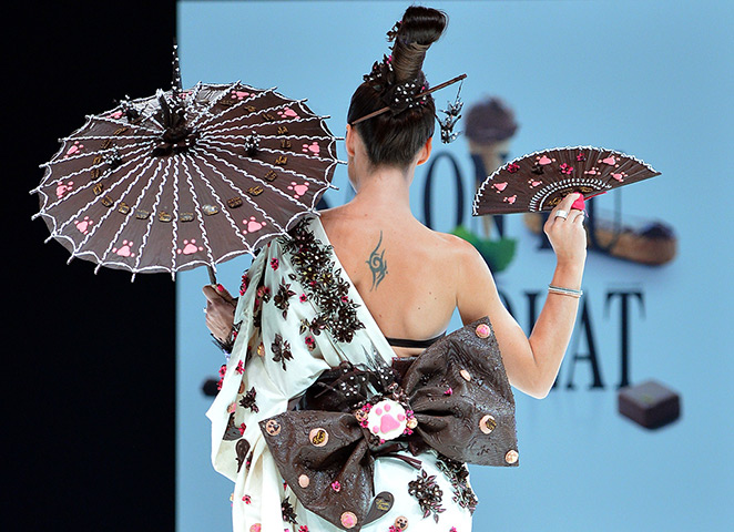 24 hours in pictures: atasha St-Pier presents a dress made of chocolate