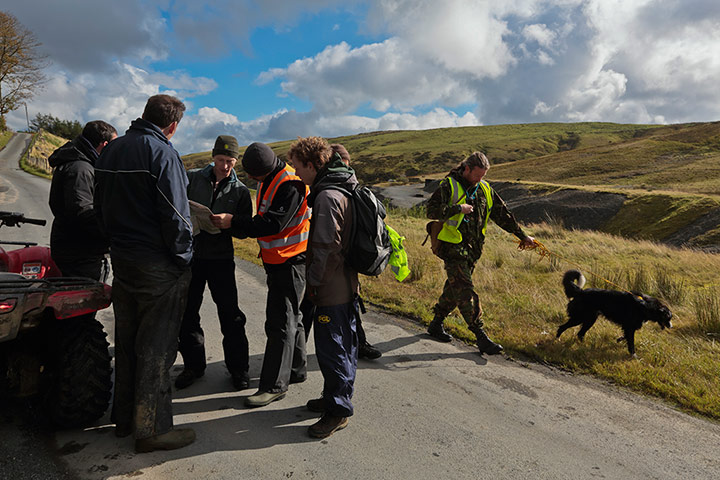 Hunting for April Jones: Searchers consult maps of the area