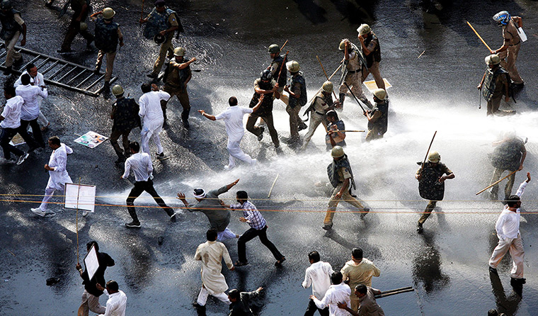 24 hours in pictures: Police use water canons to disperse demonstrators in Bhopal