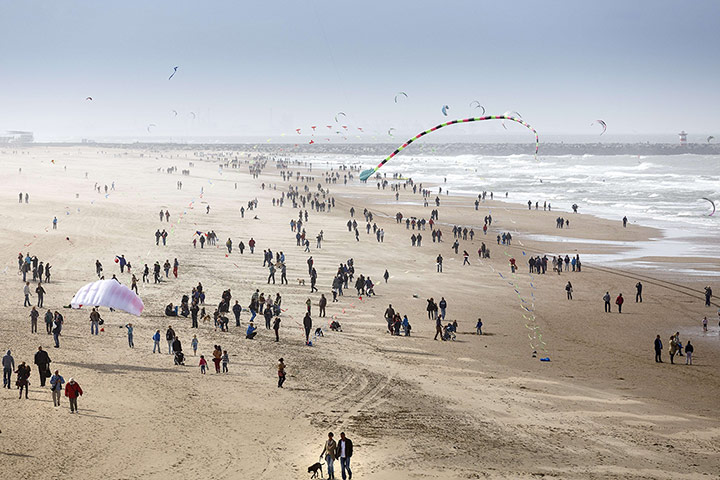 20 Photographs: People on the beach in Scheveningen, Netherlands