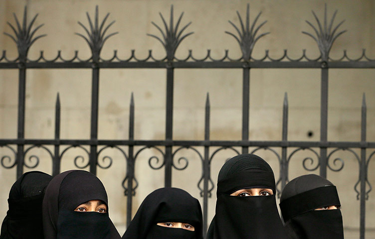 20 Photographs: Female demonstrators against the extradition of Abu Hamza al-Masri outside the Royal Courts of Justice in London