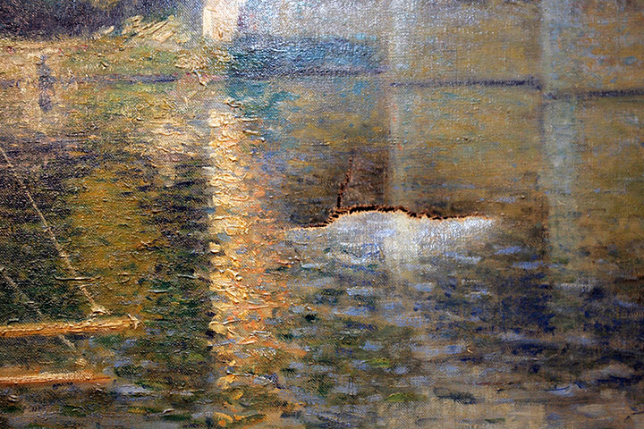 Defaced art: A 10-centimeter tear is seen in Claude Monet's Le Pont d'Argenteuil