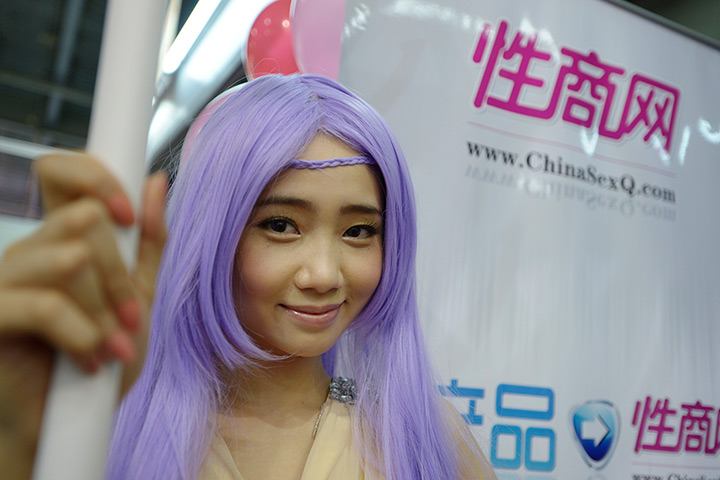 China Sex expo: A young woman dressed as a Chinese ancient figure, poses for visitors