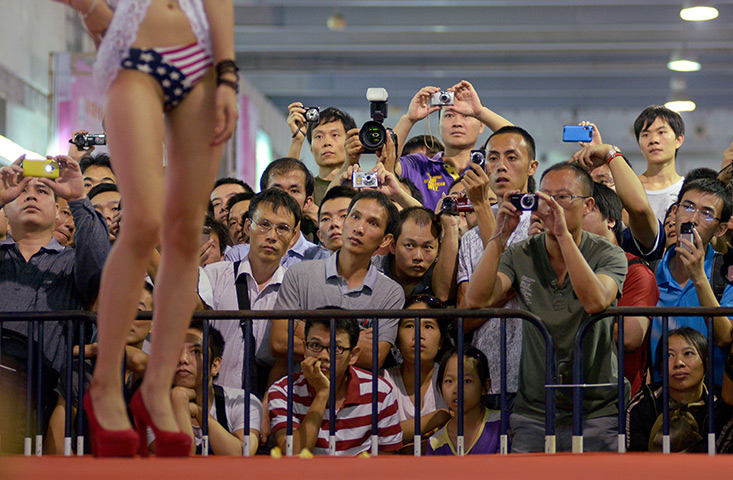 China Sex expo: The audience watch a catwalk lingerie display
