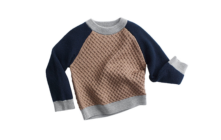 Fashion: UNICEF: UNICEF children's clothes at H&M. Boy’s waffle knit sweater, £24.99