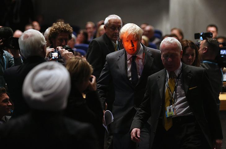 24 hours in pictures: oris Johnson arrives to speak at the Conservative party conference