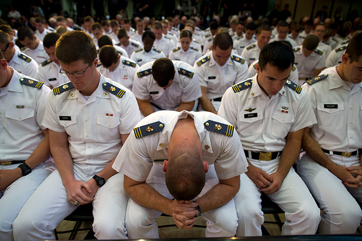 24 hours in pictures: adets at Virginia Military Institute pray before  Mitt Romney speech