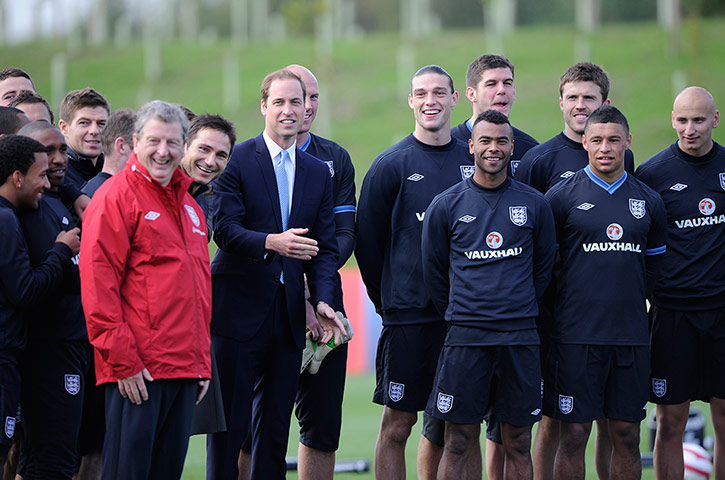 St Georges: The squad line up for a photo with their royal guests