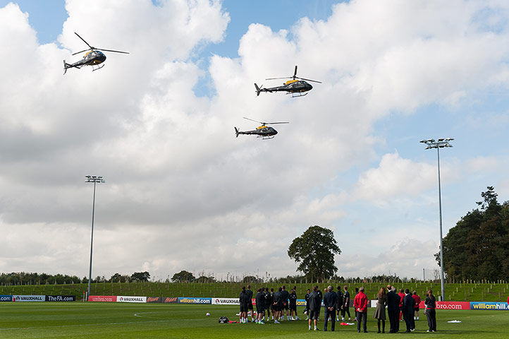 St Georges: A low fly-past by three helicopters 