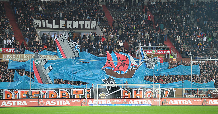 Tifo: Fans of St Pauli hold banners