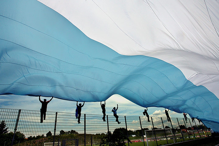 Tifo: Argentine fans wave a giant Argentine flag