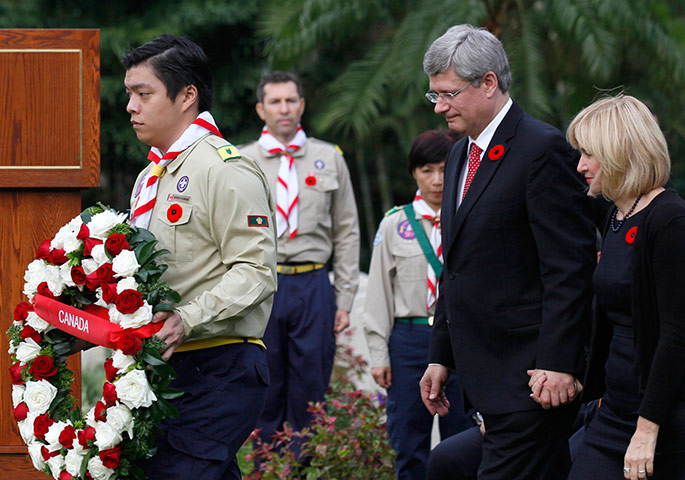 Remembrance Day: Hong Kong, China: Canadian Prime Minister Stephen Harper and Laureen