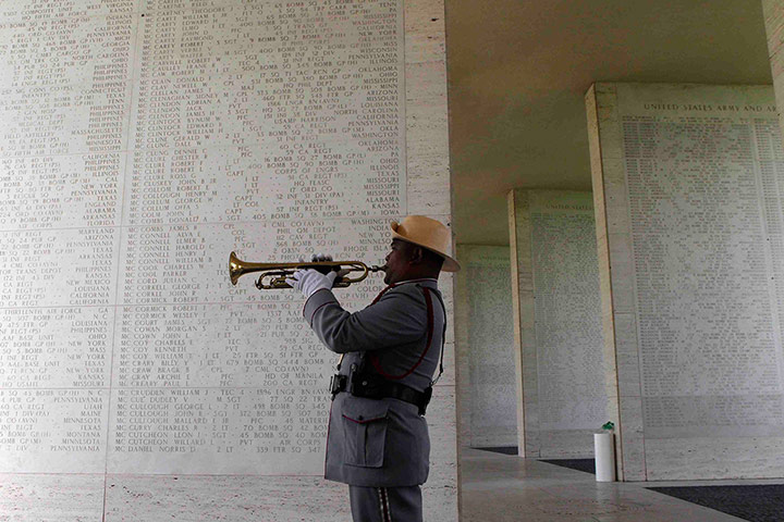 Remembrance Day: Taguig City, Philippines: A Filipino soldier plays taps
