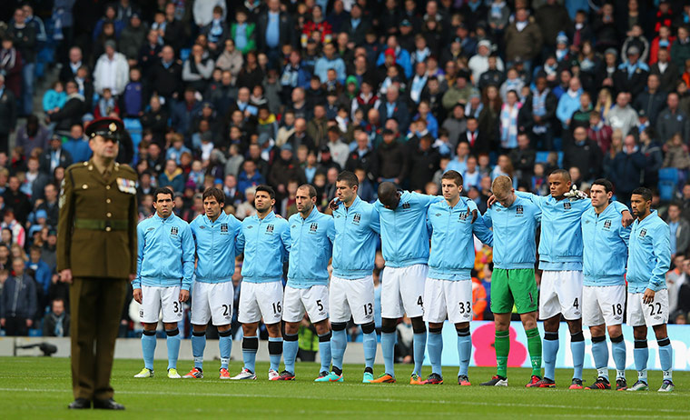 UK Remembrance Day: Manchester City players acknowledge a minutes silence