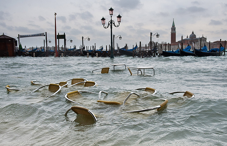 Venice floods: Chairs in St Mark's Basin