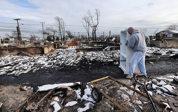 Hurricane Sandy clean-up: Storm-Damaged Communities On East Coast Hit By Nor'Easter