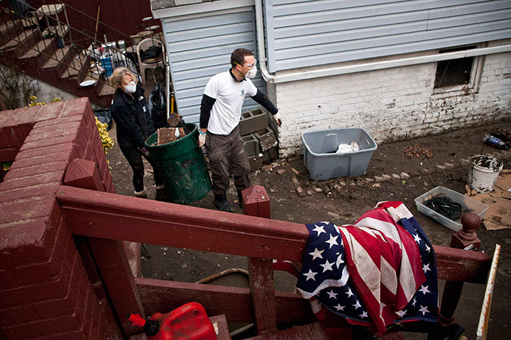 Hurricane Sandy clean-up: Volunteers help clear out a home in the Rockaway Beach neighborhood