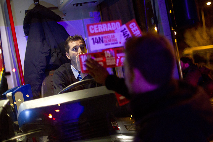 Euro protests: Madrid, Spain: Students move bins into the street