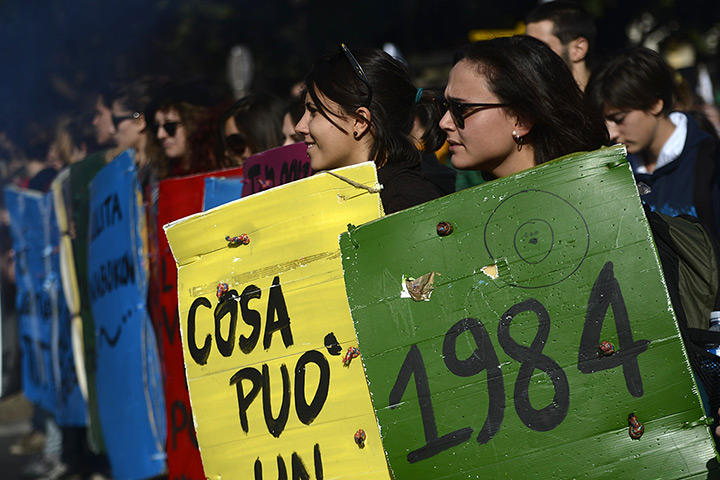Euro protests: Students hold palcards with titles of classic books 