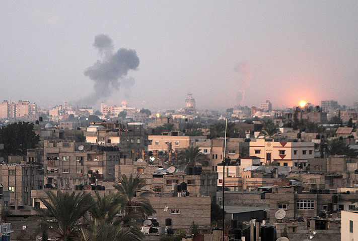 Hamas Ahmed al-Jaabari: Smoke rises following an Israeli air strike