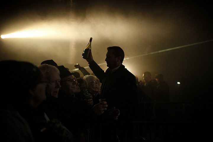 24 hours in pictures: People celebrate in Beaujeu streets for Beaujolais Nouveau