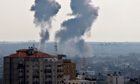 Smoke rises following an Israeli attack on Gaza City on 15 November 2012.
