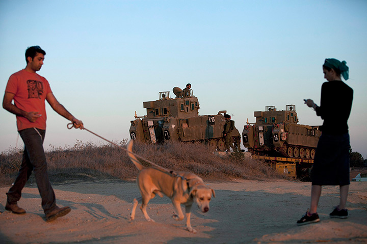Strikes update: Gaza Border: Israelis watch APCs being deployed